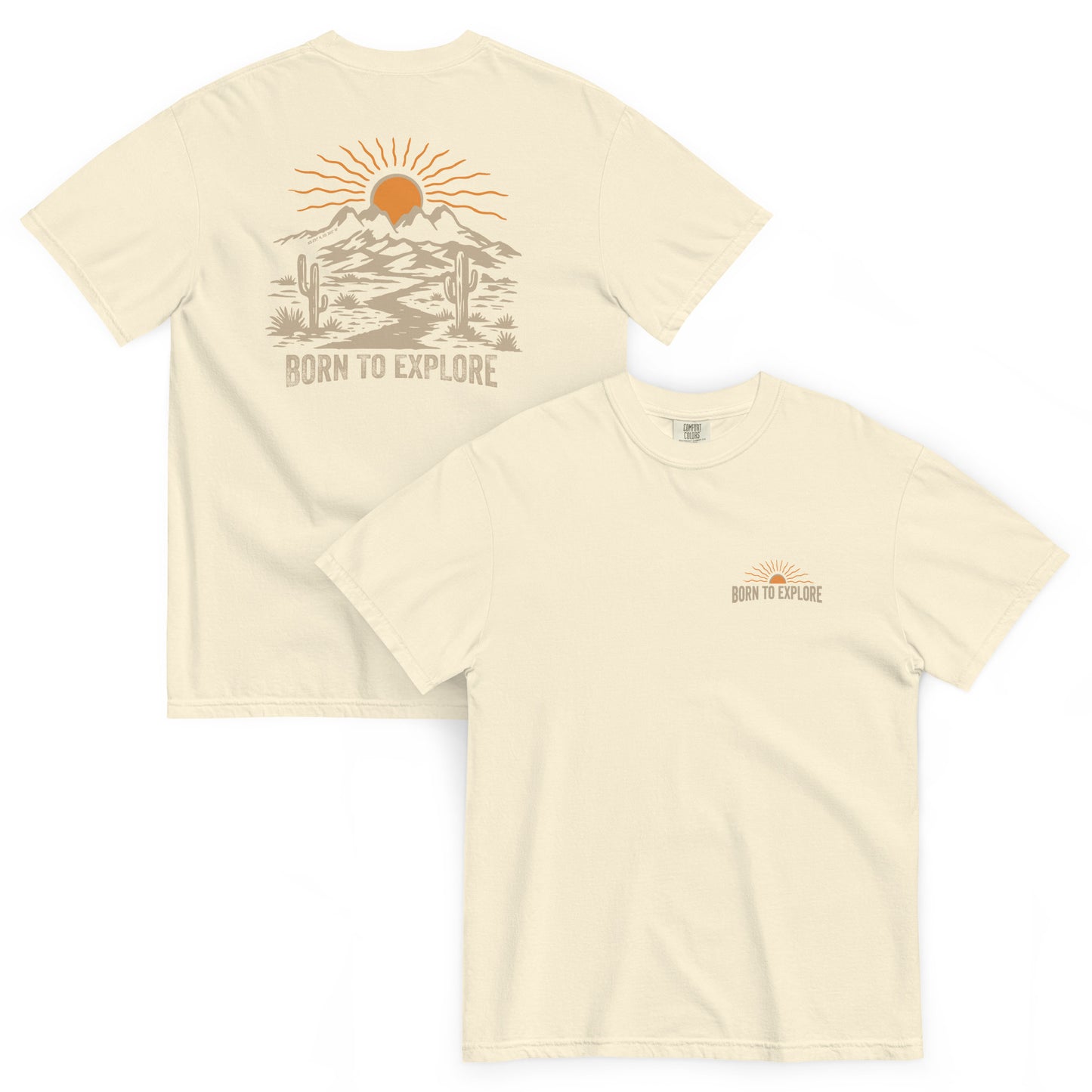 Beige t-shirt with nature themed graphic design including mountains, sun, cacti and a dirt trail with 'Born to Explore' text on a white background
