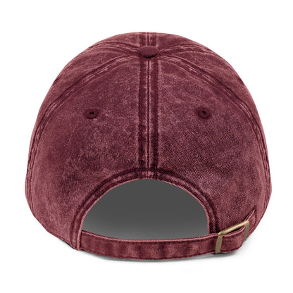 Maroon baseball cap with a strap on a white background
