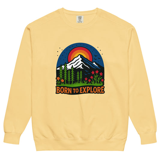 Beige sweatshirt with 'Born to Explore' mountain and meadow graphic design on a white background