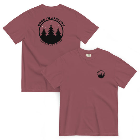 Maroon t-shirt with nature themed, black graphic design, trees, stars and the text 'born to explore, crafted by nature' on a white background